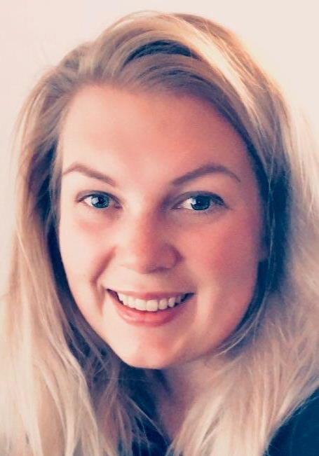 Nærbilde av Kristin som smiler. - Klikk for stort bilde